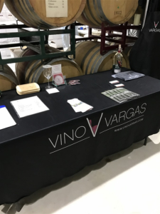 Vino Vargas information table in the barrel room